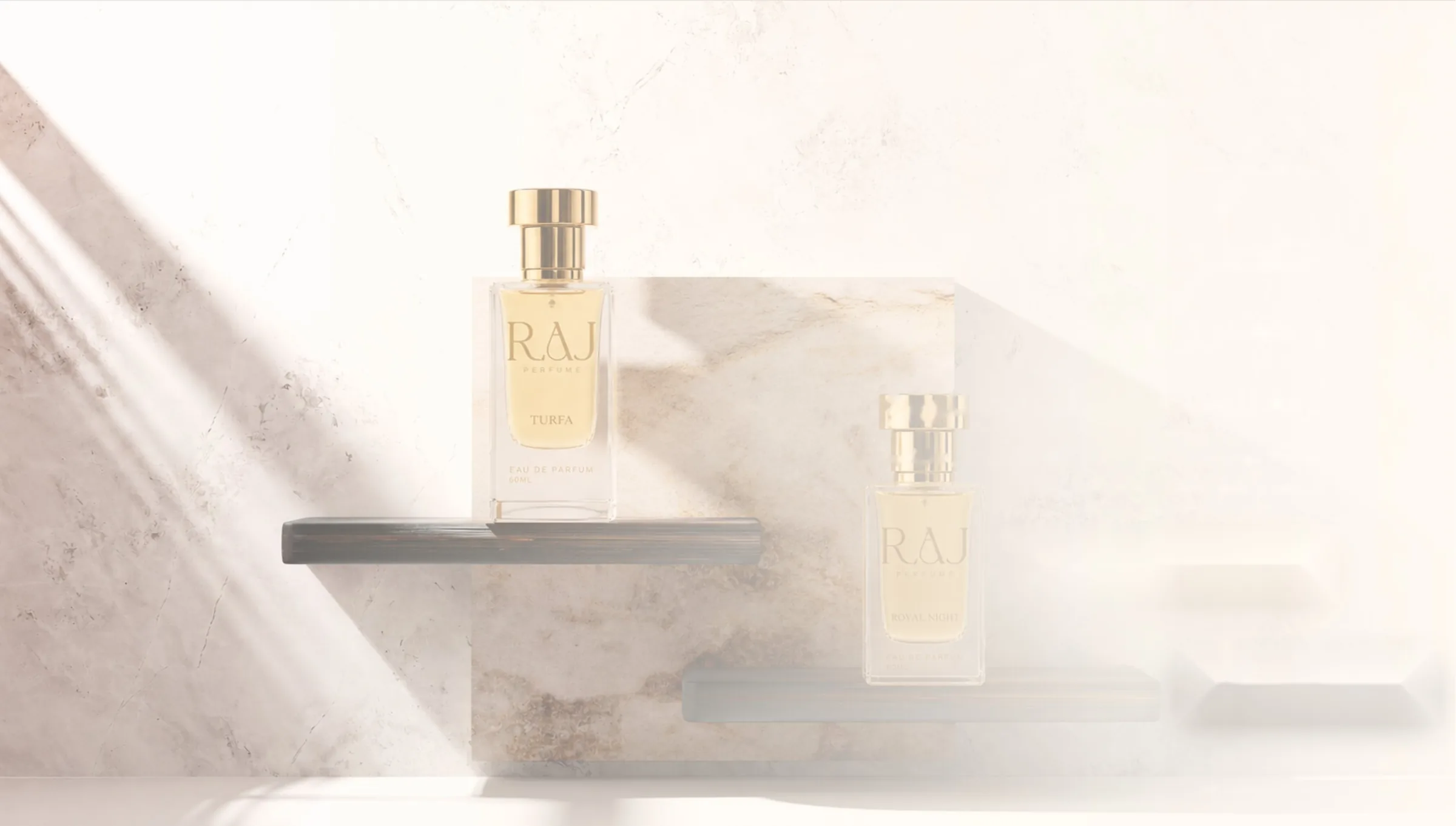 عطرا تُرفة ورويال نايت على سطح رخامي بإضاءة دافئة